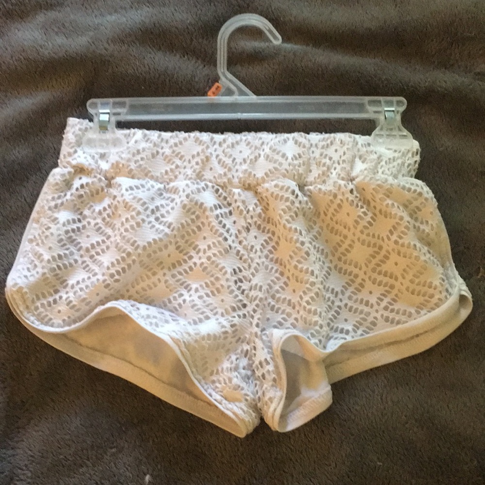 White lace shorts. Used as beach cover up once.